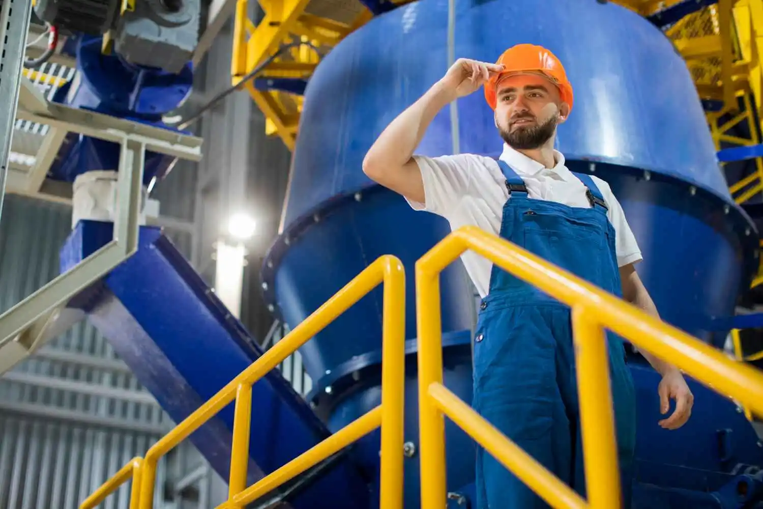 Close-up of engineers or workers with safety gear on an oil rig.
