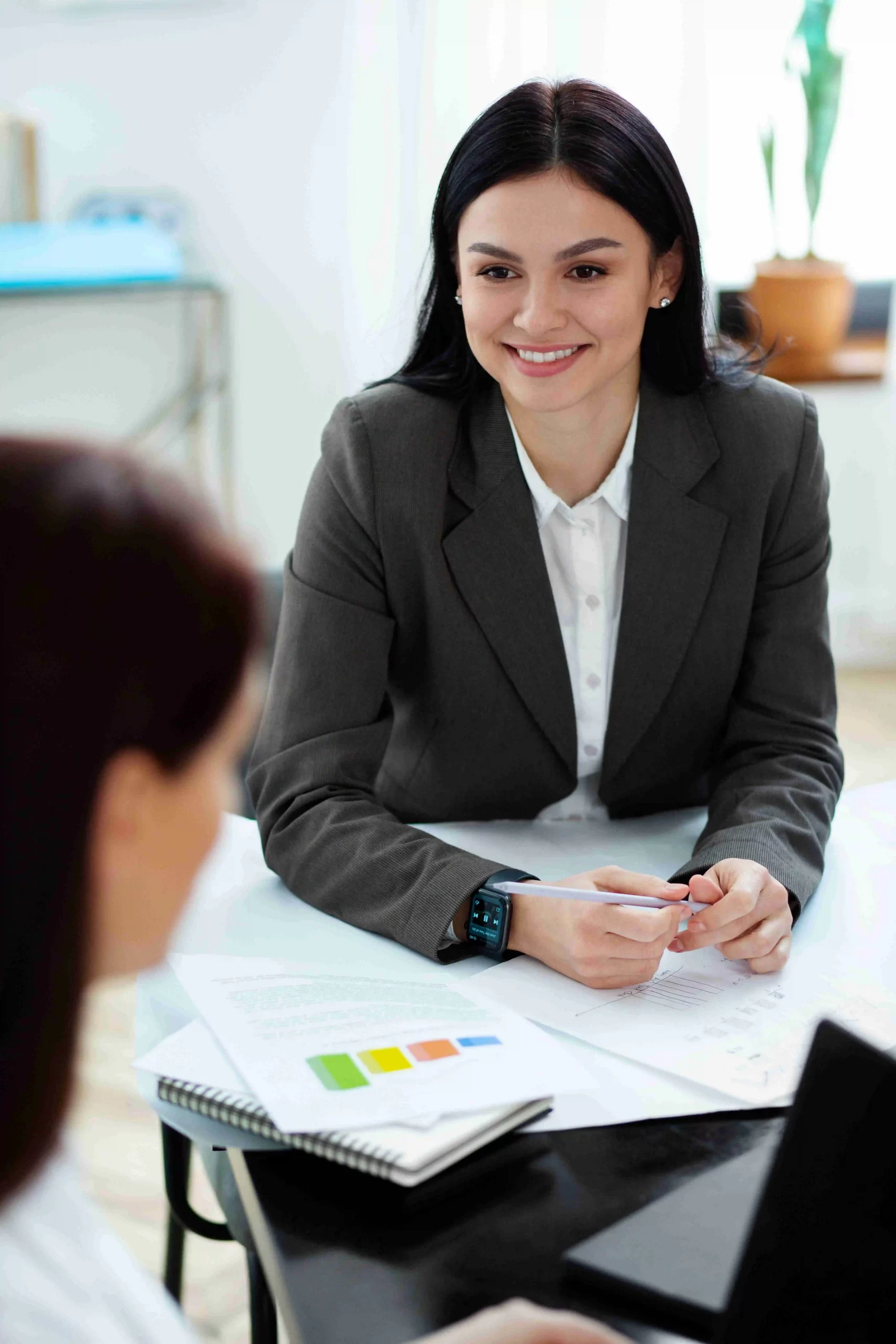 Recruiter interviewing a candidate, symbolizing the competitive advantage gained by quick response in the contingent recruitment process.